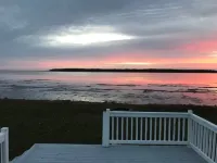 Wake up to the Sunrise in This Renovated Ocean-front Cottage!!