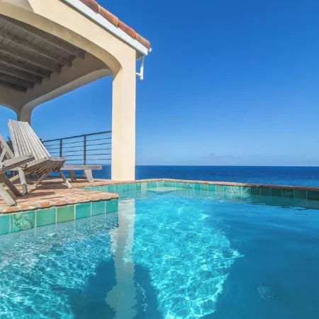 Enjoy Amazing Sea Views, Private Pool & Caribbean Breezes from This 2 Bd Villa!