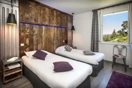 Logis Hôtel et Spa Chez Camillou Отели в г. Римез