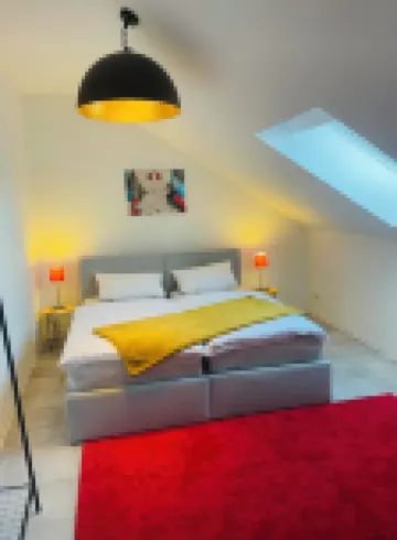 Bright, spacious attic apartment.