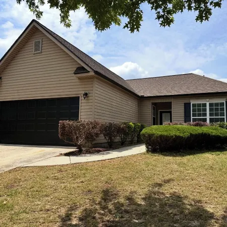 Charming 3-bedroom house in small-town Byron with WiFi, AC, and patio seating.