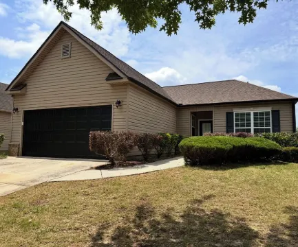 Charming 3-bedroom house in small-town Byron with WiFi, AC, and patio seating.