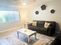 Beautiful Home in quiet neighborhood with a pool and close to stores & highways.