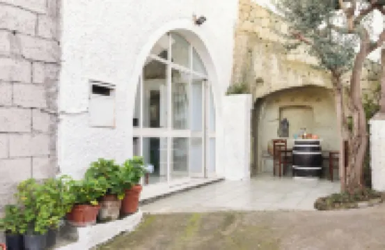 Appartamento in pietra di tufo verde Ischitana, Forio