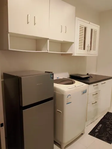 รูปภาพของCozy 1-bedroom mountain view condo with AC and WiFi in charming Panwa