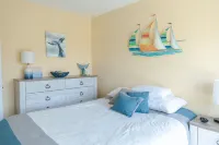 Only Five Steps From The Beach Access!