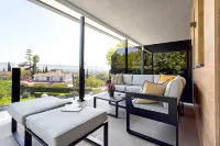 Elegant apartment with terrace & pool.Arruzafa V Hotels in El Brillante