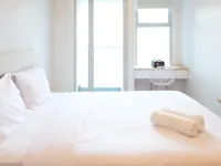 Cozy Stay Studio Connected with Mall at Supermall Mansion Apartment By Travelio Hotéis em Sambikerep
