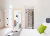 Monolocale Riva – Wi-Fi, Clima e Giardino a Torre Lapillo - 4-Star