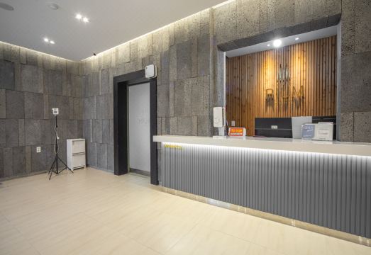 리움호텔의 넓고 깨끗한 침대 이미지