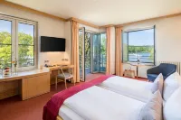 Seehotel Rheinsberg Отели в г. Нойглобзо
