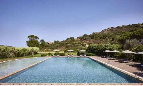 Baia Chia Laguna Resort, Curio Collection by Hilton