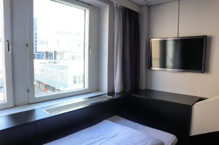 Comfort Hotel Xpress Stockholm Central Отели рядом с достопримечательностью «Vesslan skulptur»