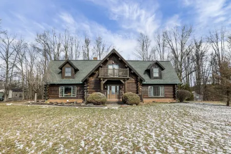 Enchanted log cabin with lake view