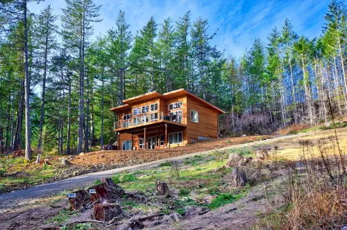 Water Views from this New Northwest Modern Home w/ Hot Tub