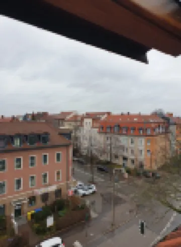 One-room apartment above the roofs of downtown Erfurt