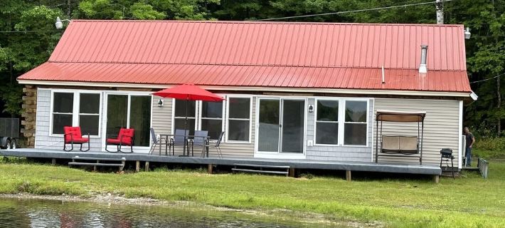 Beautiful private beach area within steps from the modern updated log home Hotels in Ellsworth