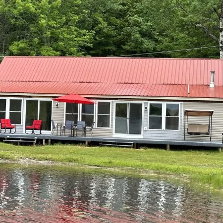 Beautiful private beach area within steps from the modern updated log home