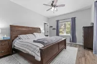 Family Friendly lake home, beach, level lot, fire pit, game room, dog friendly!