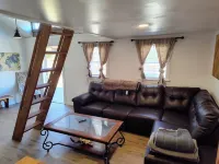 One bedroom cabin with an extra loft sleeping space minutes from the Frio River!