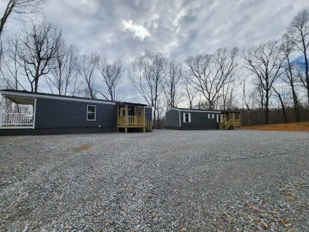 Cozy cottage w/1 bedroom, WiFi, AC in tranquil Springville close to boat ramps