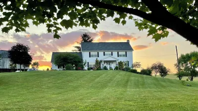 Cozy country basement studio apartment, with a large yard and woods.