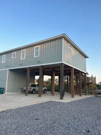 Bream Street retreat. New home in BSL on the water with boat launch. Sleeps 10.