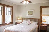4 Beds, 4 bathrooms! 1 block to town shops, bars, bowling, canoeing, and parks!