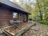 Beautiful log cabin with all the creature comforts of home. Private fishing lake
