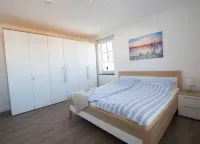 Apartment beach life. 2 bedrooms, high quality furnishings, great sea views! Hotels in Börgerende-Rethwisch