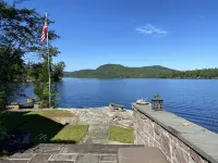 Beautiful Brant Lake home with direct lakefront, hot tub and snowmobile access!
