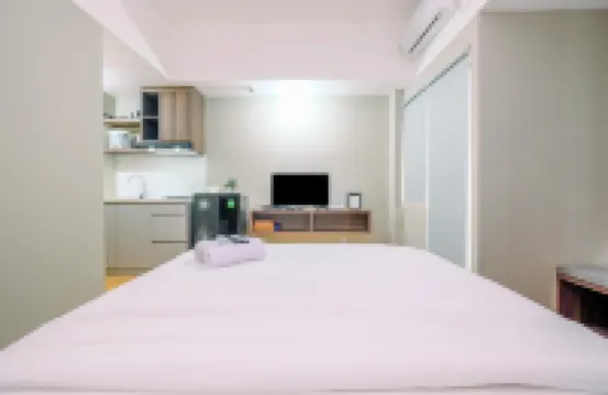 Comfortable Pool View Studio Room at LRT City Jatibening Apartment
