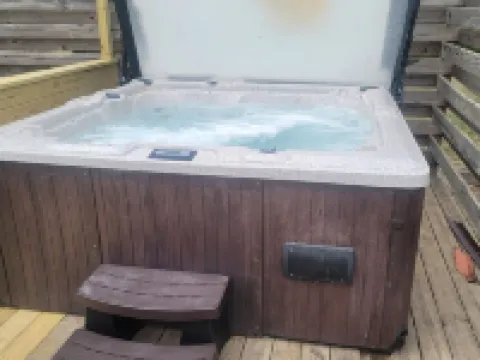 Hot Tub! Outside Traverse City, Sleeps 6 Pet Friendly, Fire Place, Fire Pit Hotels in Interlochen