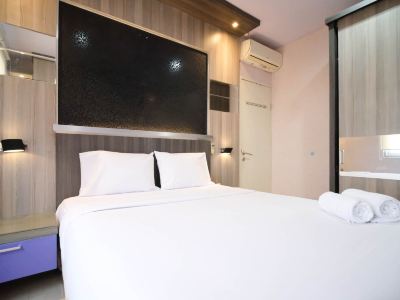 Best Location and Homey 2Br at Twin Tower Apartment