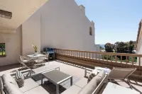 Malibu 2-bedroom designer furnished condo with AC. Central to everything!