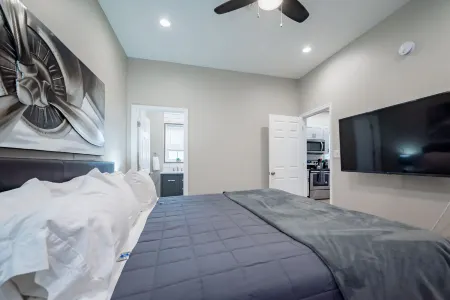 Exposed Brick and Modern Kitchen Amenities - Charming Historic Retreat