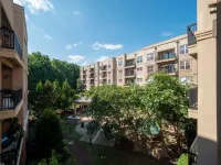 Courtyard Views and Attached Parking - Elegant Urban Sanctuary