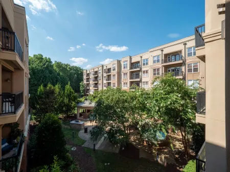Courtyard Views and Attached Parking - Elegant Urban Sanctuary