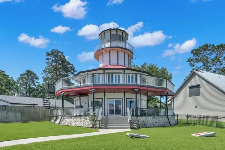 Waterfront Lighthouse with Large Dock for a Great Family Getaway