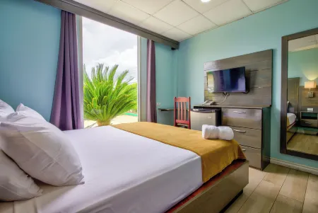 Airport Suites Hotel Отели в г. Tunapuna