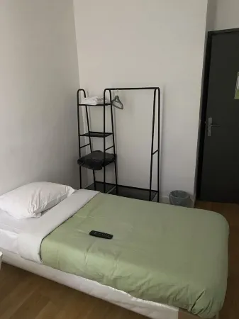 Le Palmier Отели рядом с достопримечательностью «Groupe AFNOR»