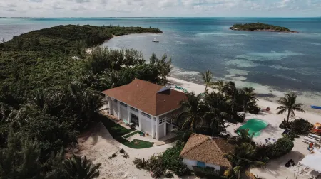 Guana Beach Inn Отели в г. Грэйт Гвана Кей