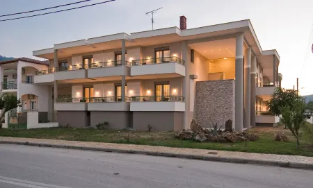 Alexander Inn Отели в г. Милиес