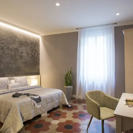 Pistoia Inn - Downtown's Charming Rooms