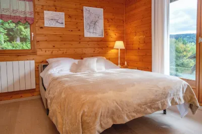 Charmant F2 Dans Chalet Avec une Terrasse vue lac Hotels near Location de Ski le Grand Haut