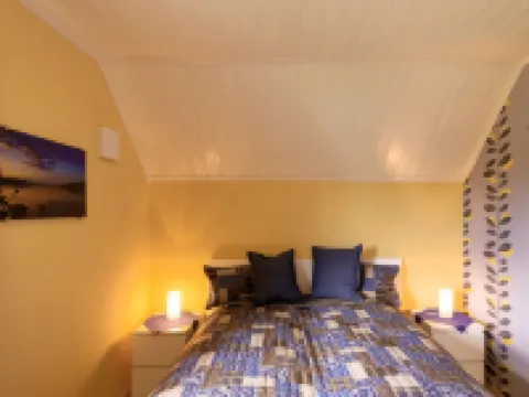 Idyllic sunny lakeside location with only 20 m to the private jetty and boat.