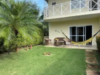 Condominium in front of a beautiful Guarajuba beach, 200 meters on foot, with WIFI and SKY Hotels in Guarajuba