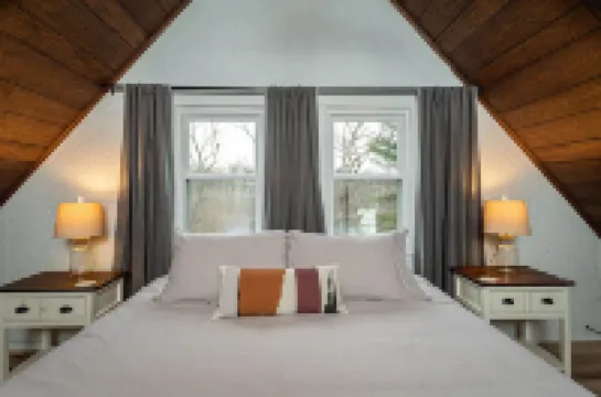 Modern Riverfront A-Frame Cabin w/ Hot Tub, Fire Pit, Kayaks, Canoe, & Arcade