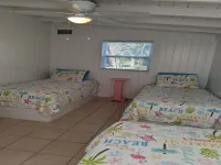 Adorable Pink Cottage-Ocean Front on Coco Bay with a Dock. 25% Fall Discount!