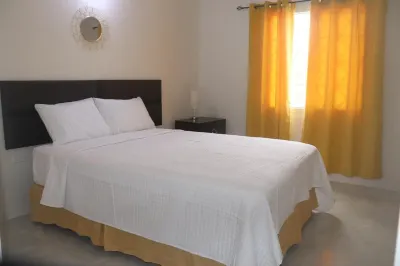 Safe gated community 5 minutes from beach and famous attractions. Hotels near Green Grotto Caves